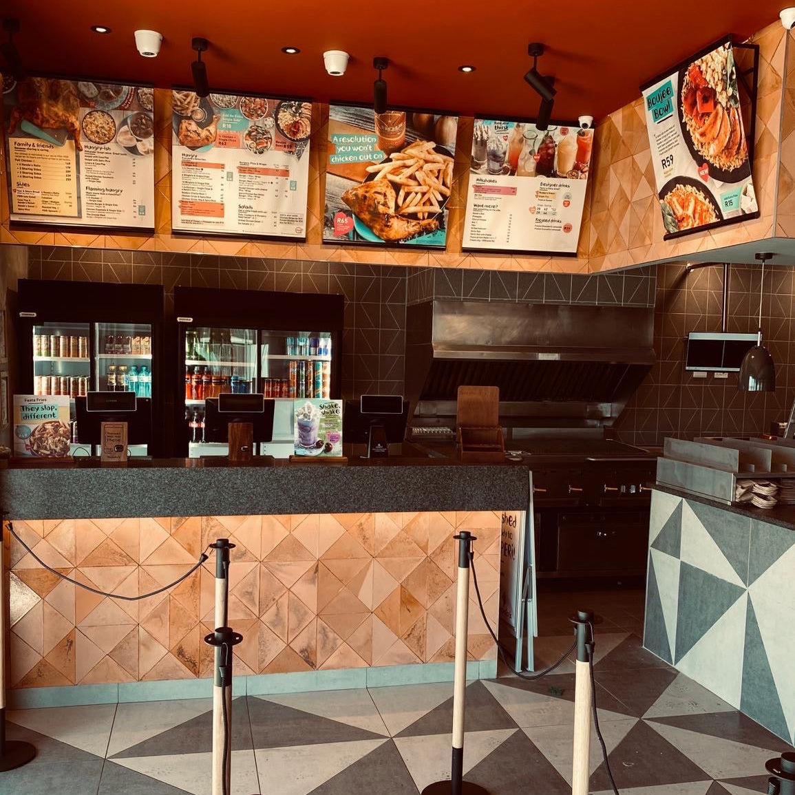 Scallop Tile on wall in Nandos