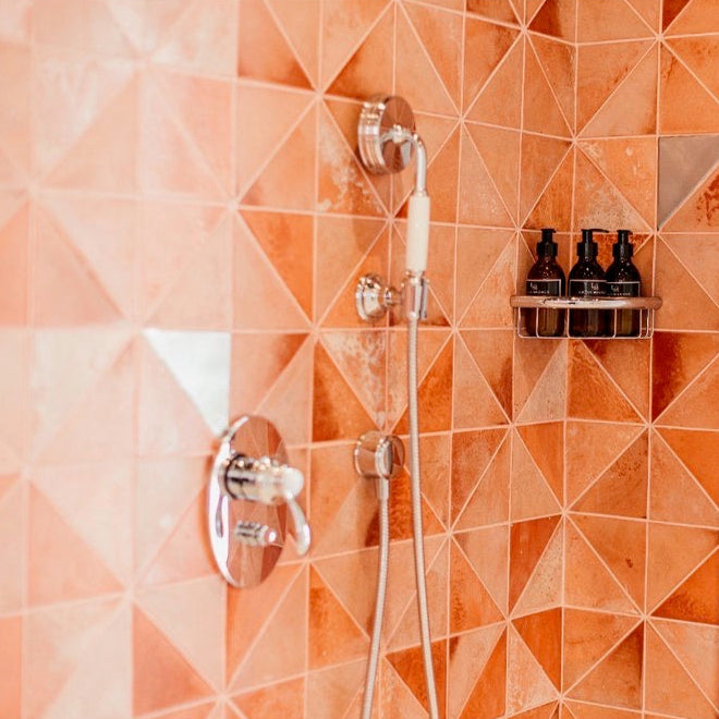 Thia Tile on a wall in a shower